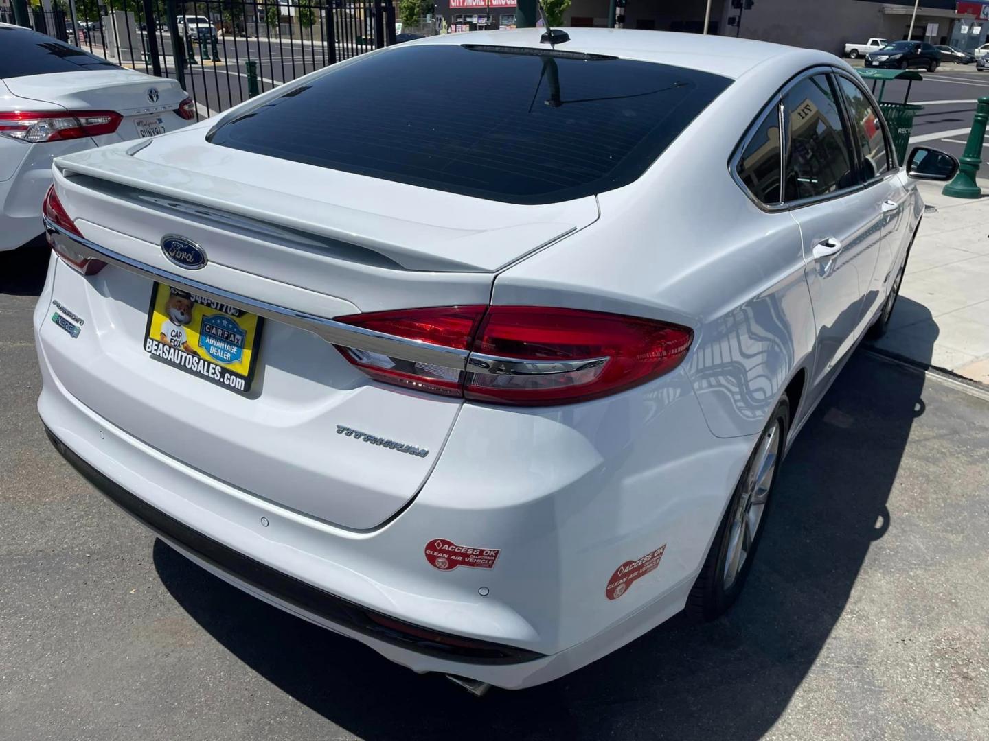 2018 WHITE /BLACK Ford Fusion Energi Titanium (3FA6P0SU6JR) with an 2.0L L4 DOHC 16V HYBRID engine, CVT transmission, located at 744 E Miner Ave, Stockton, CA, 95202, (209) 944-5770, 37.956863, -121.282082 - PLUS TAXES AND FEES - Photo#14